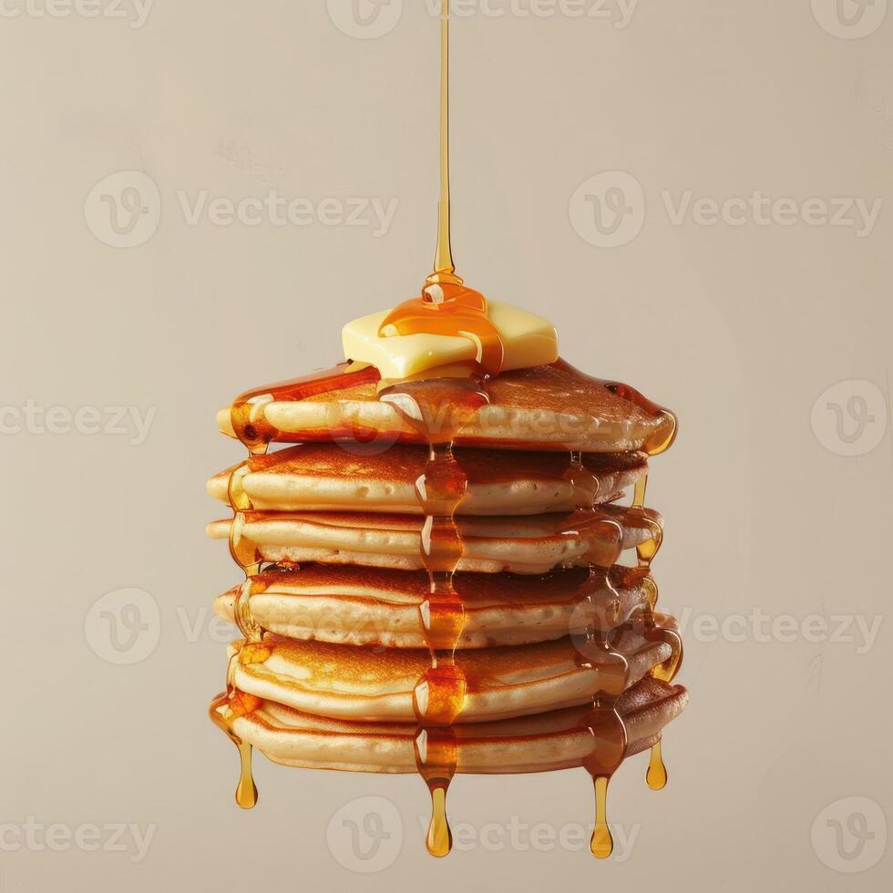 a stack of pancakes with syrup dripping from them photo