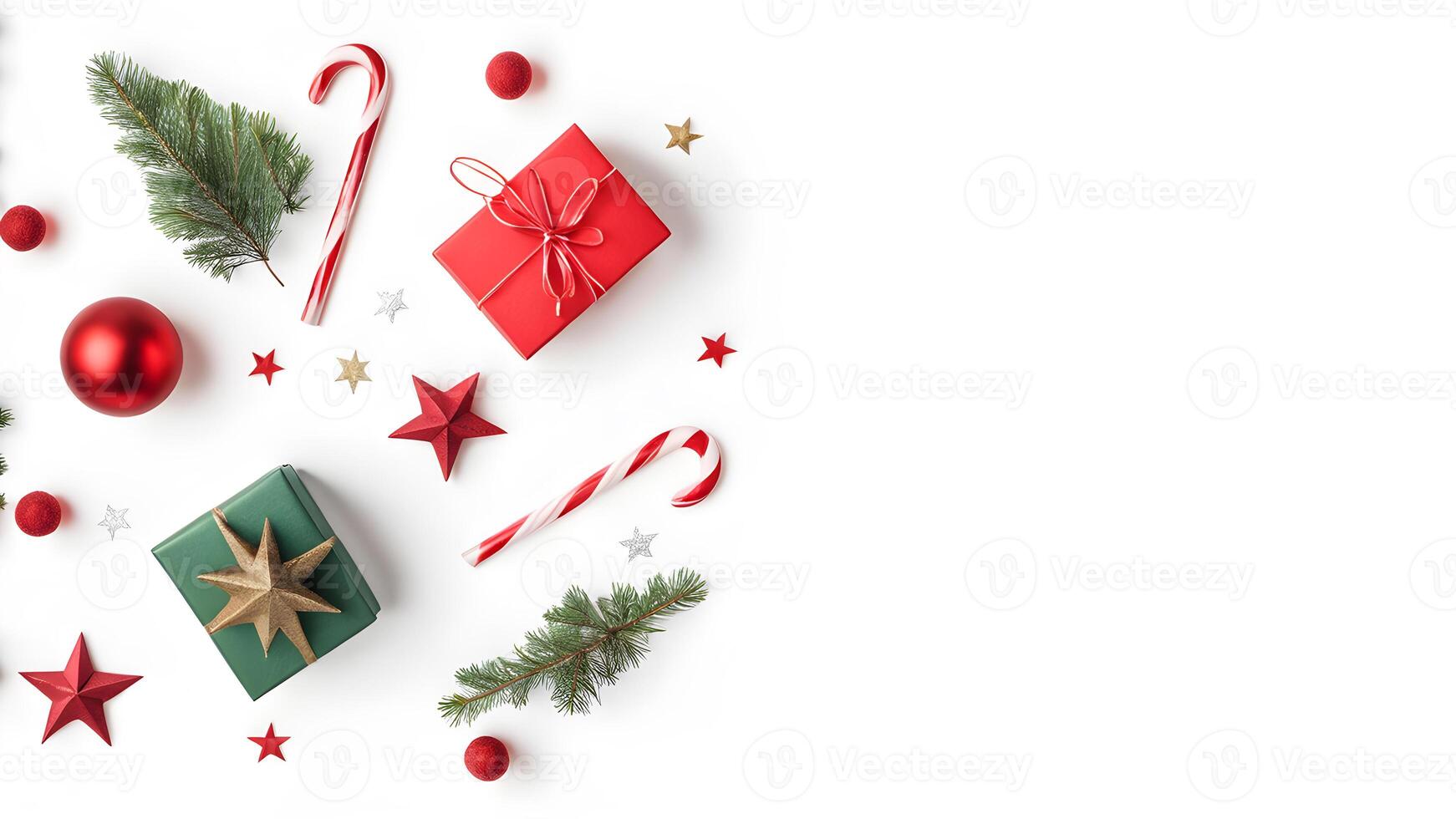 Top view layout with right blank space adorned red and green gift box, shiny balls, star, pine tree branch, candy cane on white background like snow photo