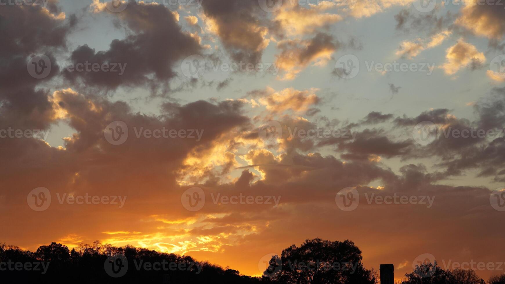The beautiful sunset sky view with the colorful clouds as background photo
