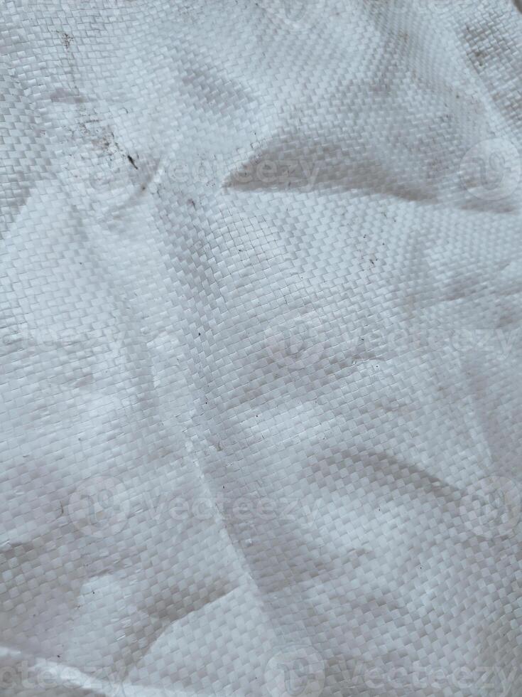 white sack texture and pattern. Arranged on a simple white background. For banners, website covers photo