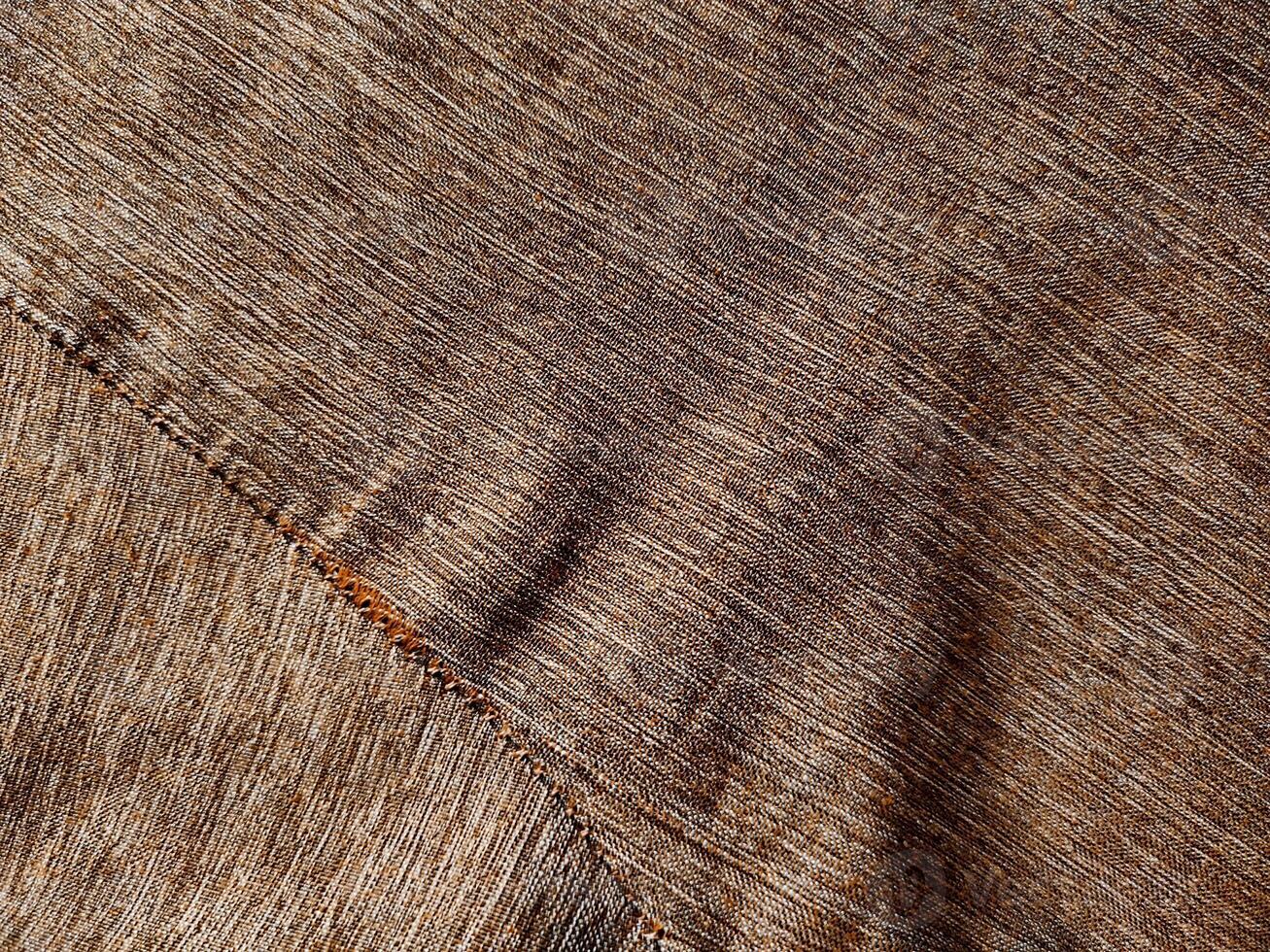 Texture and background of natural wood grain lines on a fabric photo