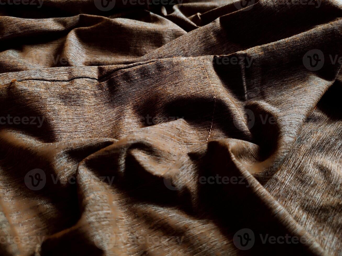 Texture and background of natural wood grain lines on a fabric photo