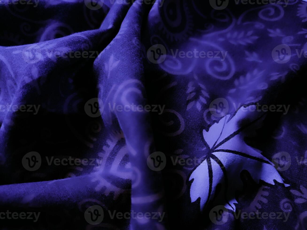 purple fabric pattern and background with leaf design photo
