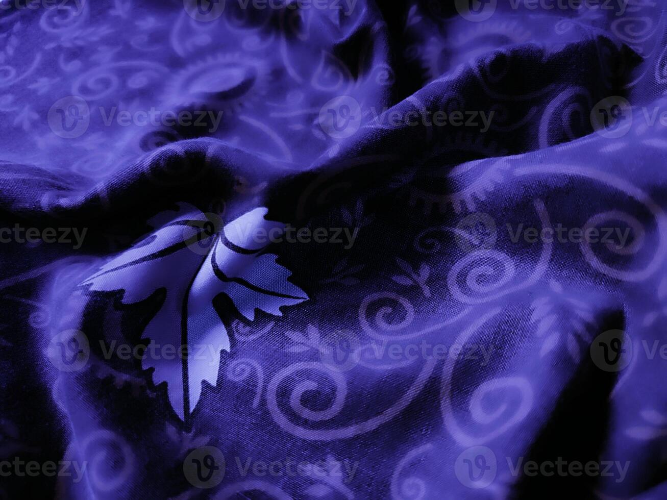 purple fabric pattern and background with leaf design photo