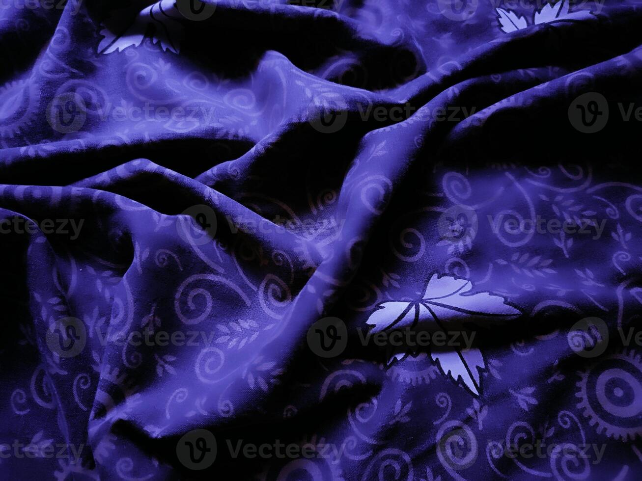 purple fabric pattern and background with leaf design photo