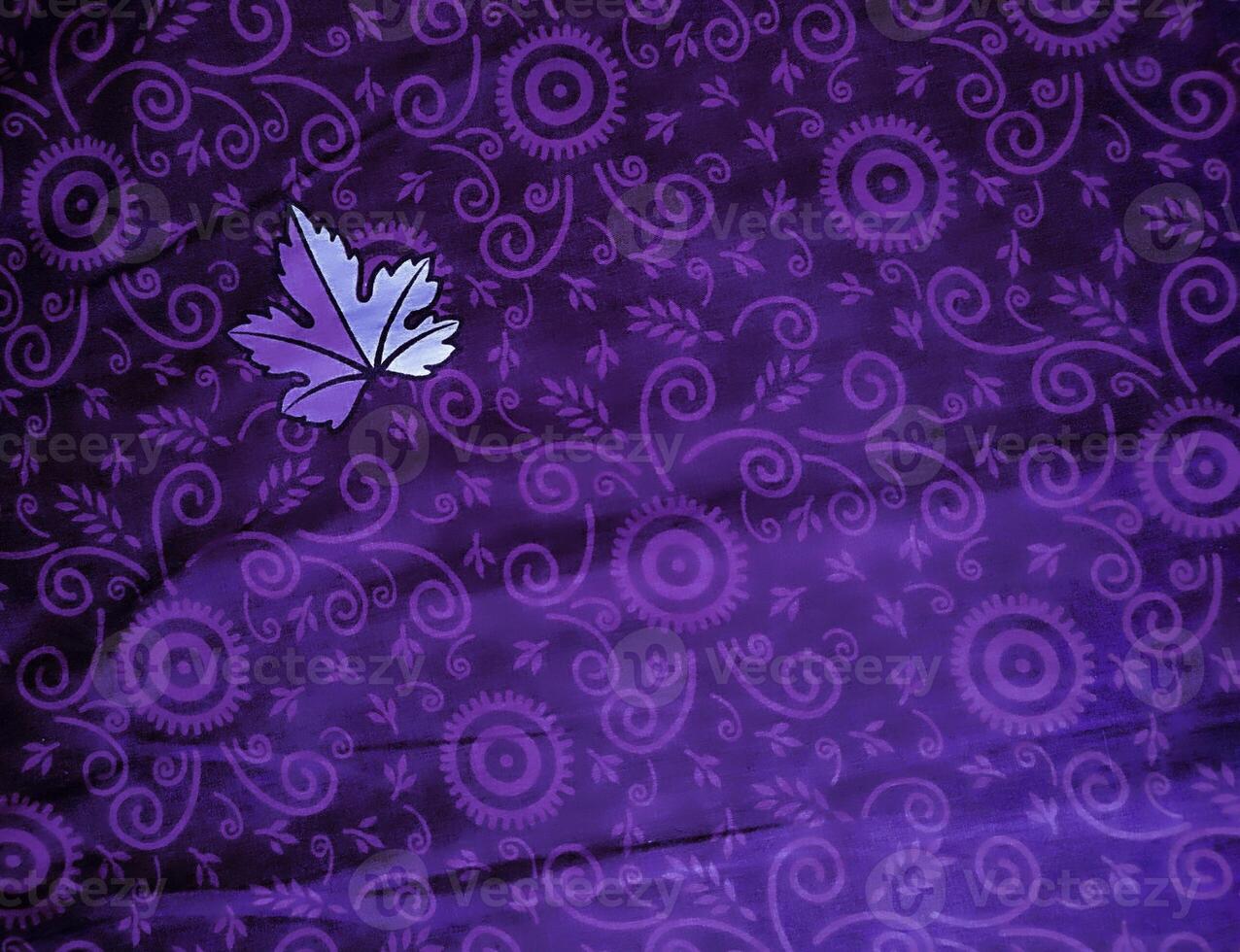purple fabric pattern and background with leaf design photo