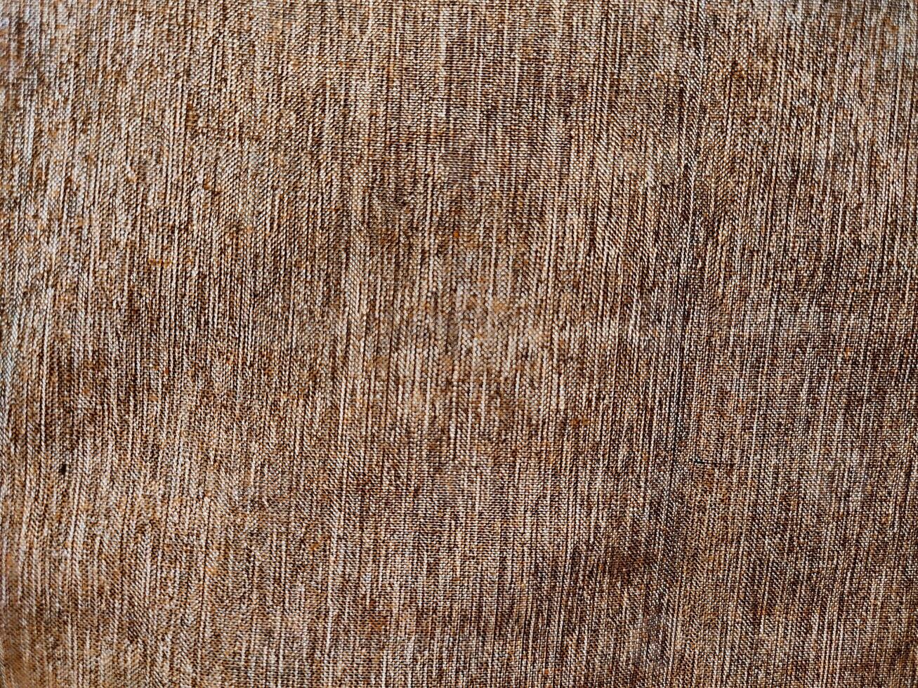 Texture and background of natural wood grain lines on a fabric photo