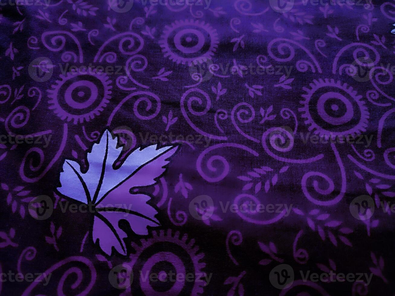 purple fabric pattern and background with leaf design photo