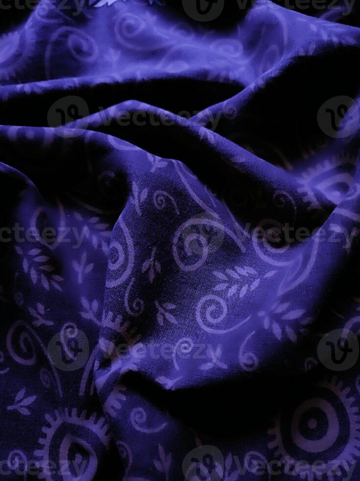 purple fabric pattern and background with leaf design photo