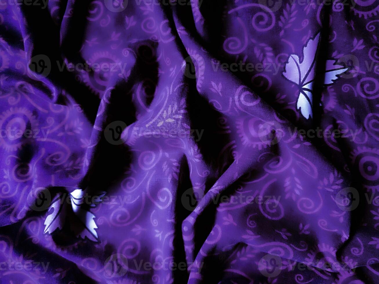 purple fabric pattern and background with leaf design photo