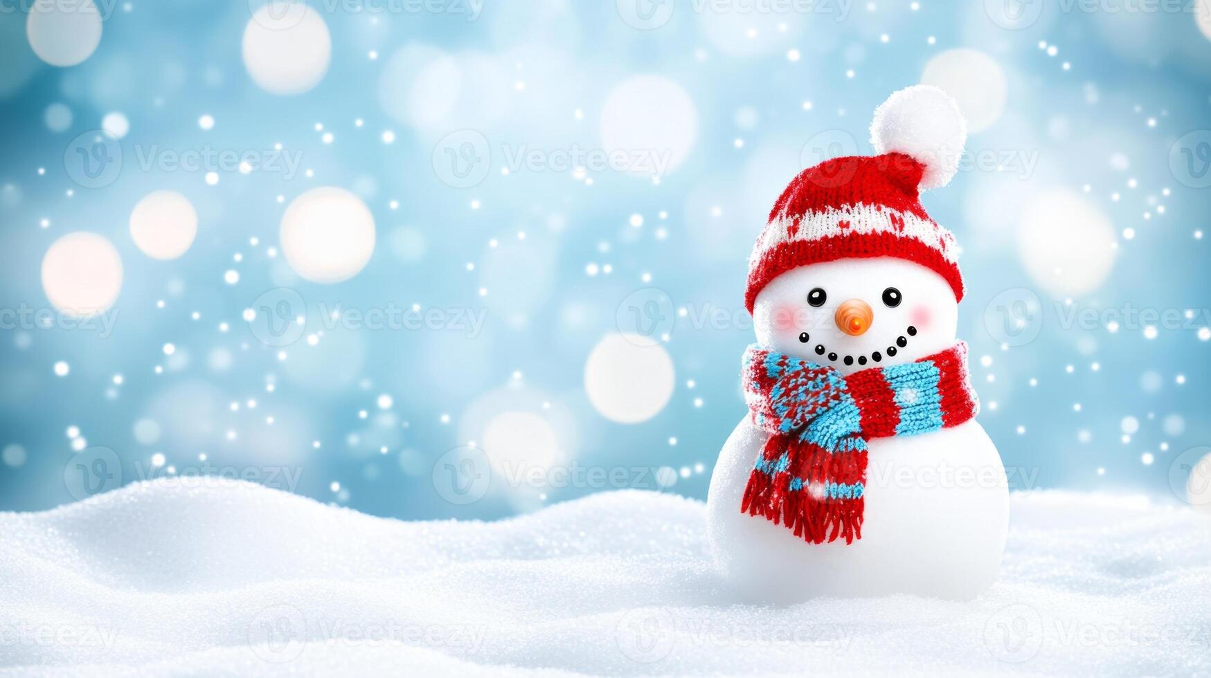 Snowman wearing knitted scarf and hat standing on snowdrift photo