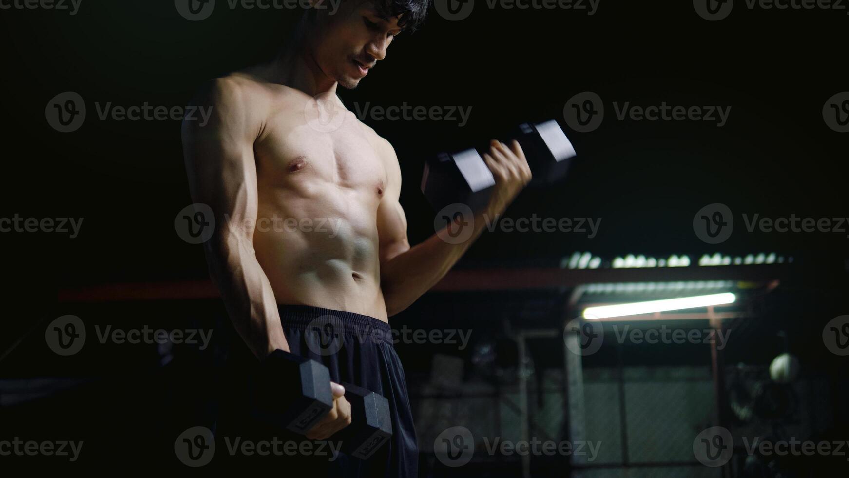 Dumbbell exercise, weight lifting and muscle building, healthy activities photo