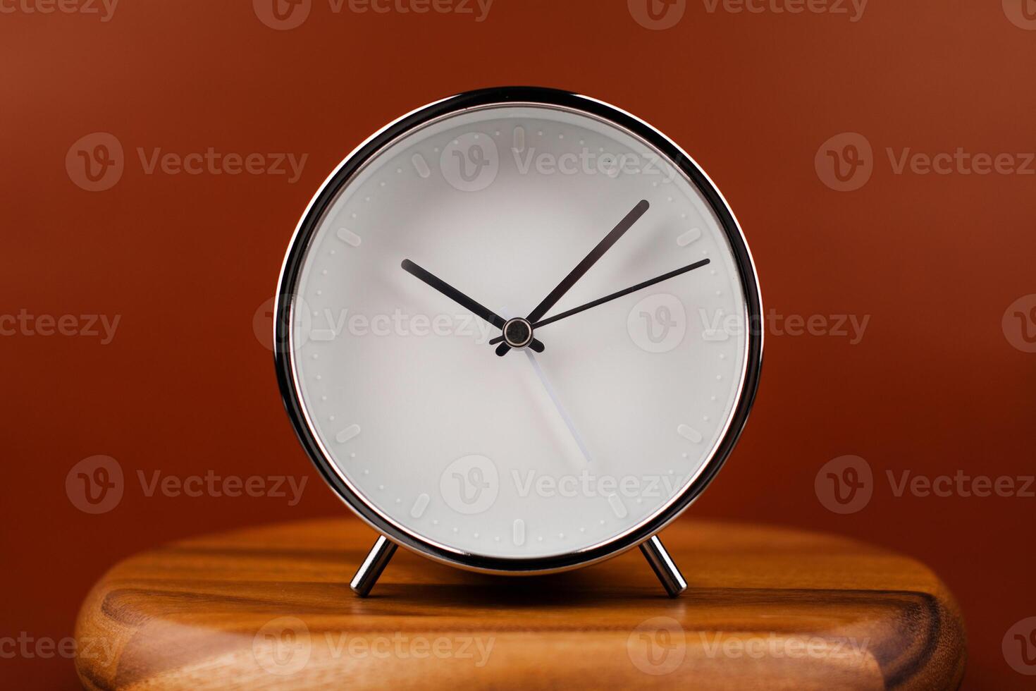 Alarm clock still photo in studio. Concept of time and working with valuable time.