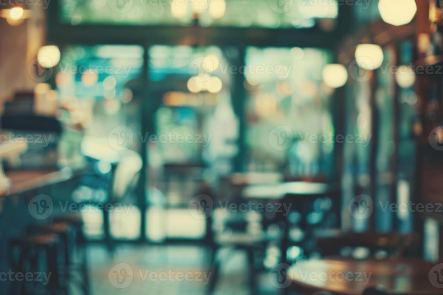 Blurred abstract atmospheric cafe background, soft lighting and cozy interior. photo