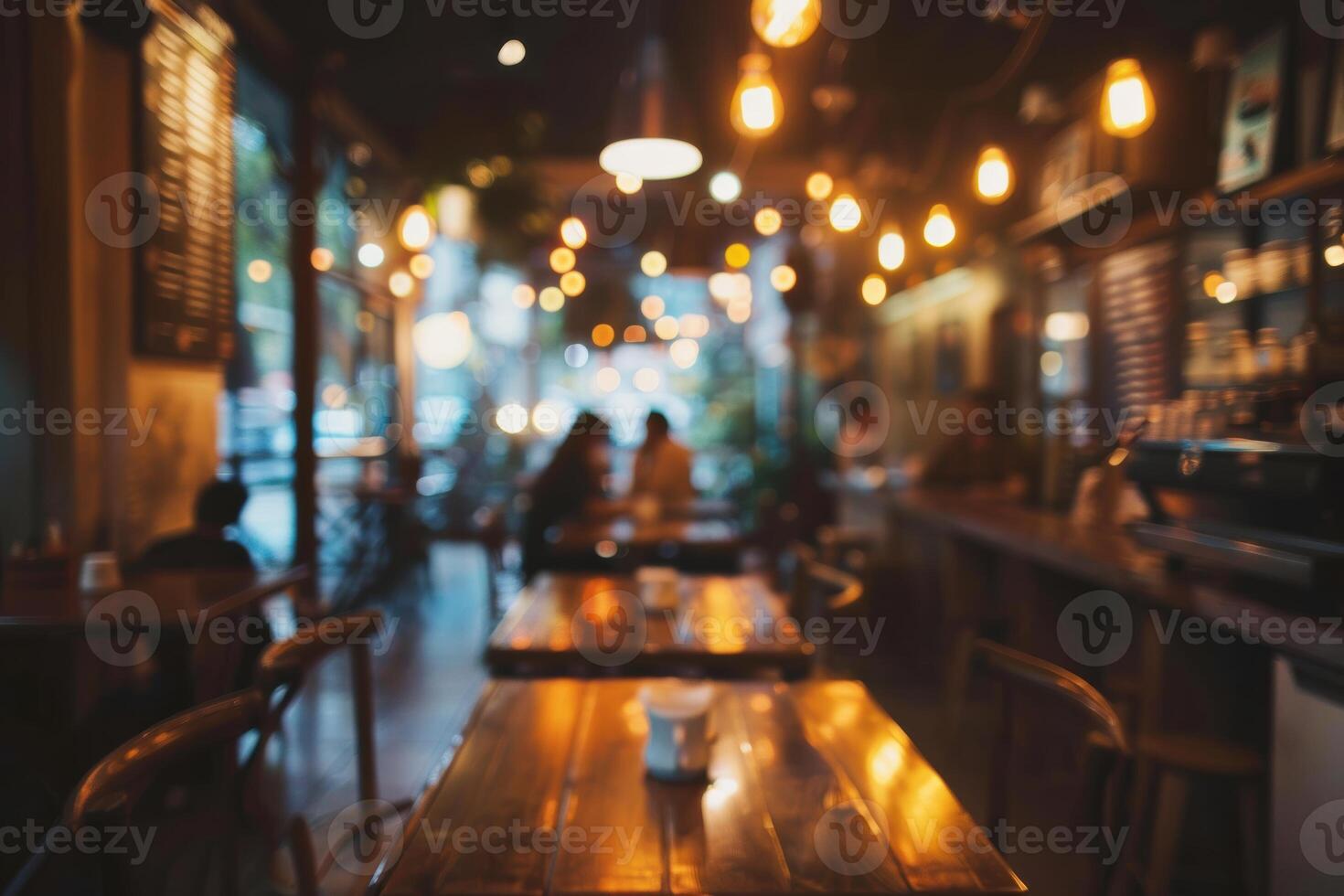 Blurred abstract coffee shop background, atmospheric cozy cafe interior shot. photo