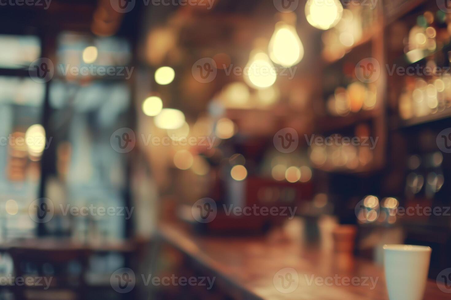 Blurred abstract coffee shop background, atmospheric cozy cafe interior shot. photo