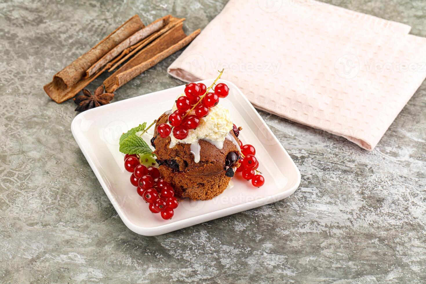 Delicous cupcake with red currant photo