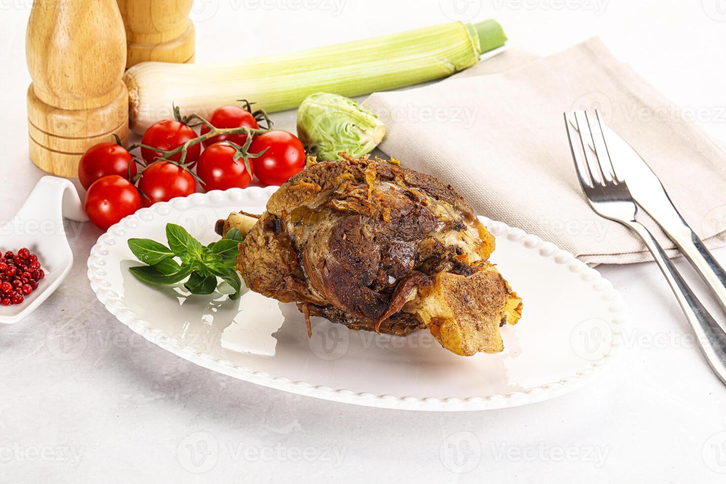 Baked Lamb shank with bone photo