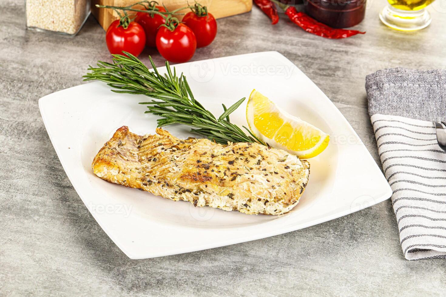 Baked salmon fish served rosemary photo