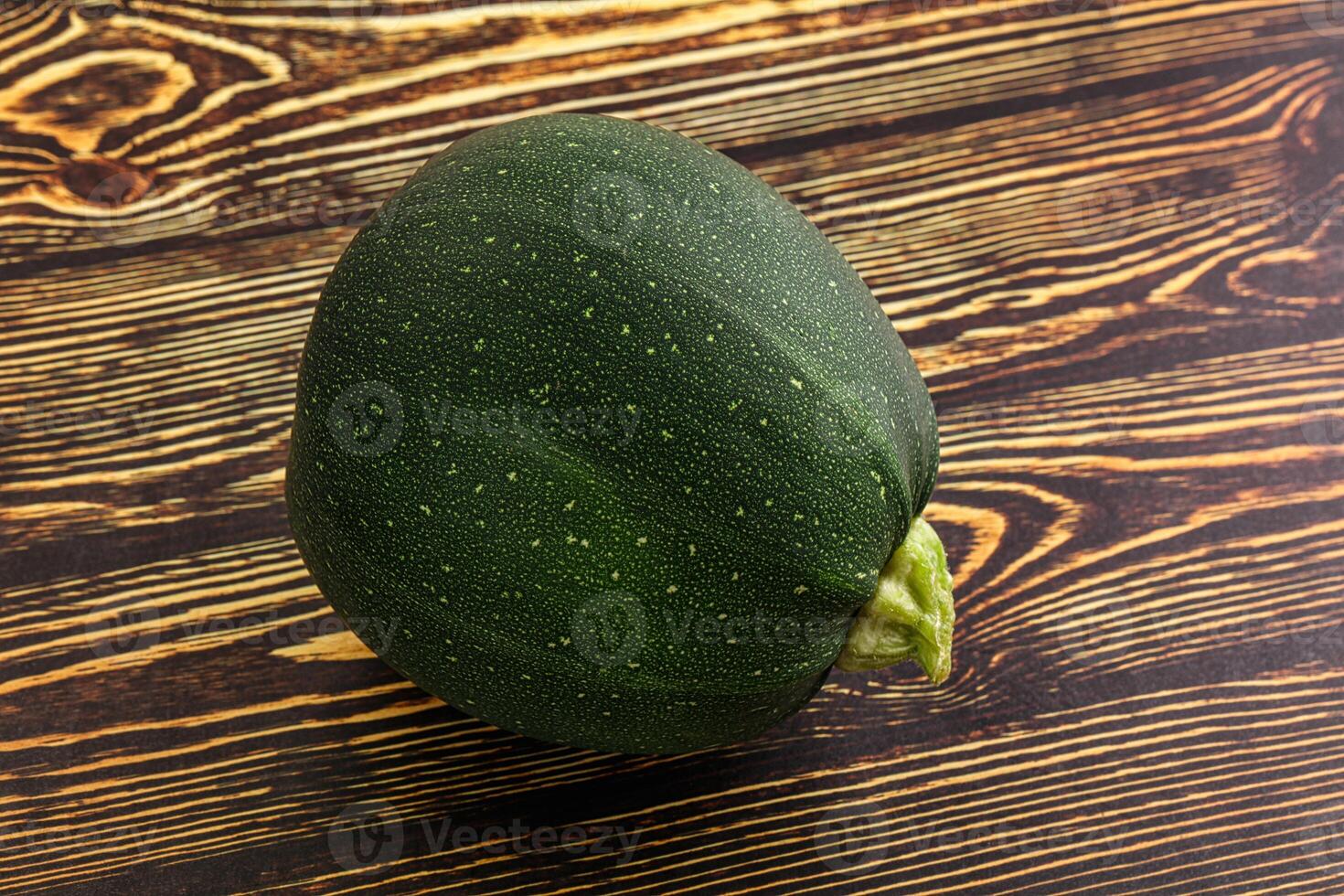 Raw green round zucchini vegetable photo