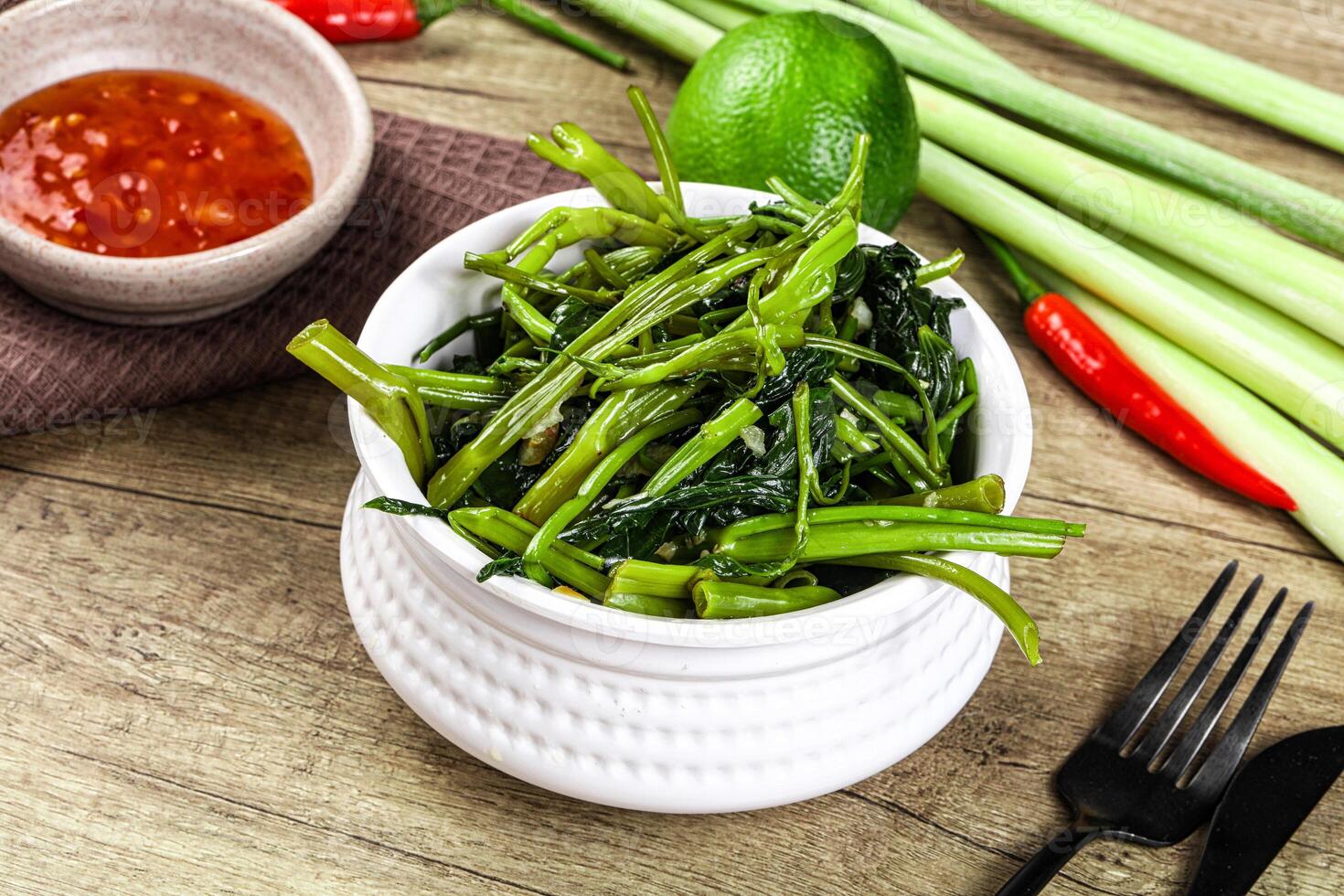 Asian cuisine stir fried morning glory photo