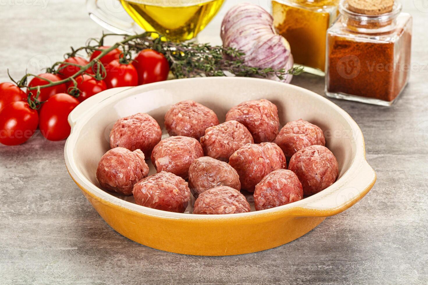 Uncooked raw beef meatball minced photo