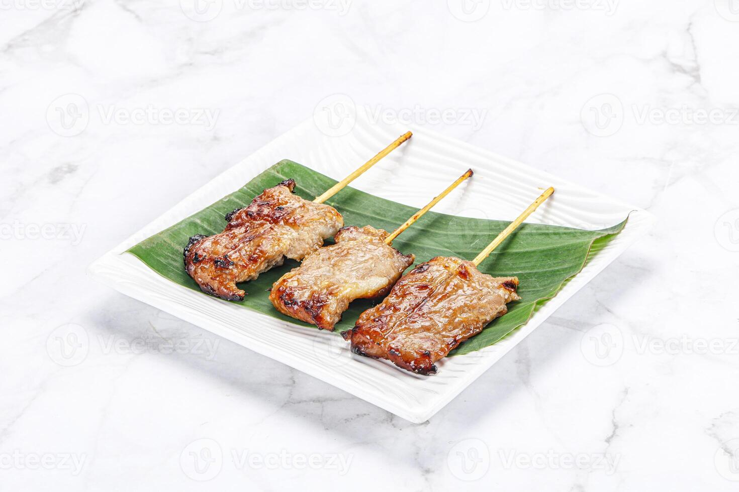 Thai cuisine - grilled pork skewer photo