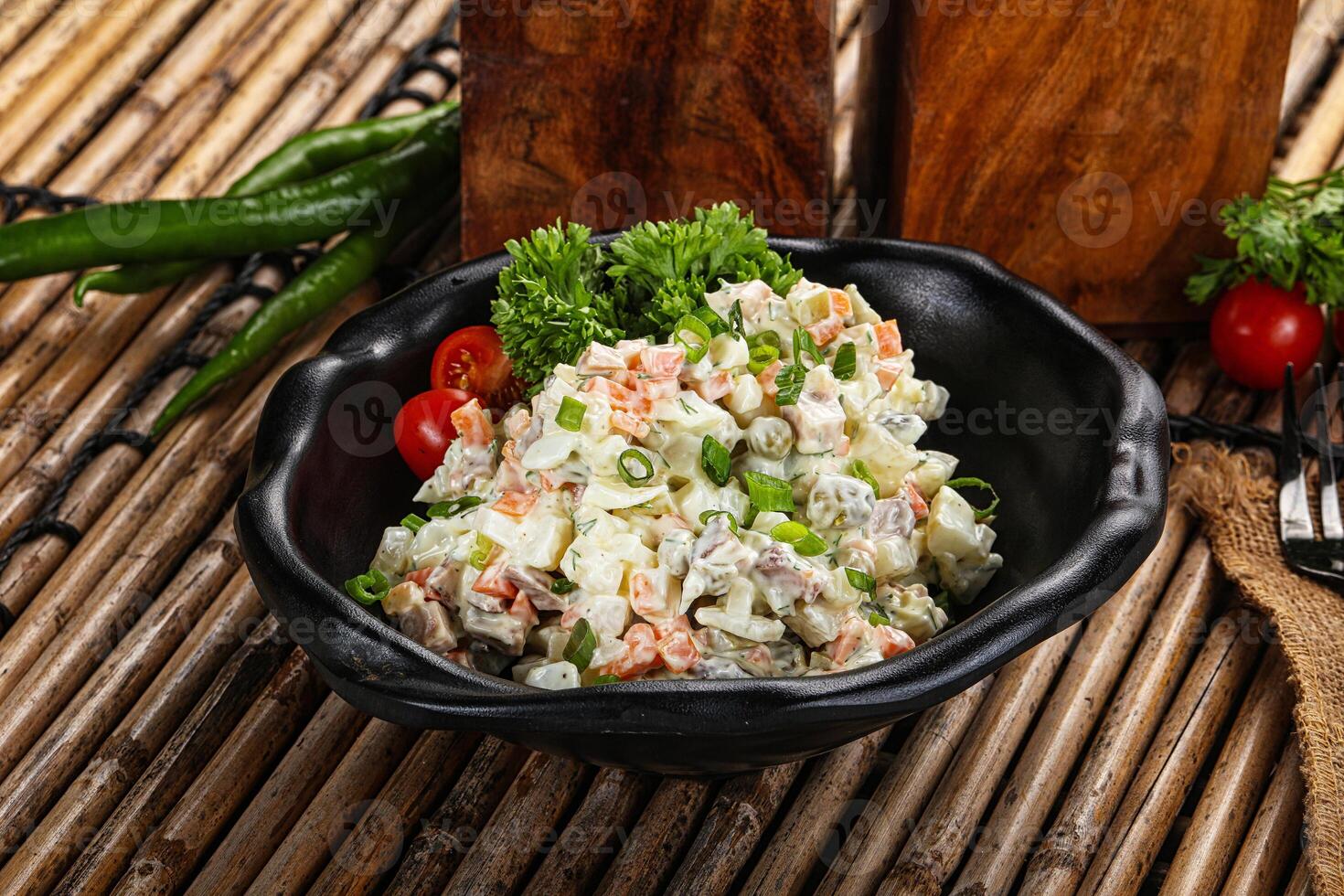 Traditional Russian salad with mayonnaise photo