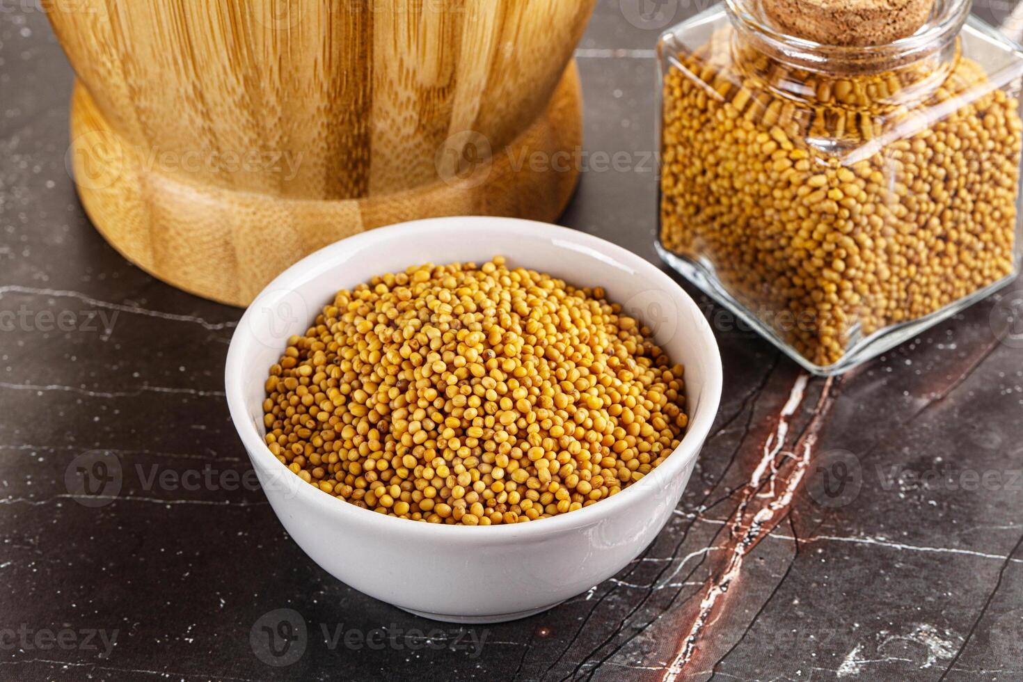 Mustard dry seeds in the bowl photo