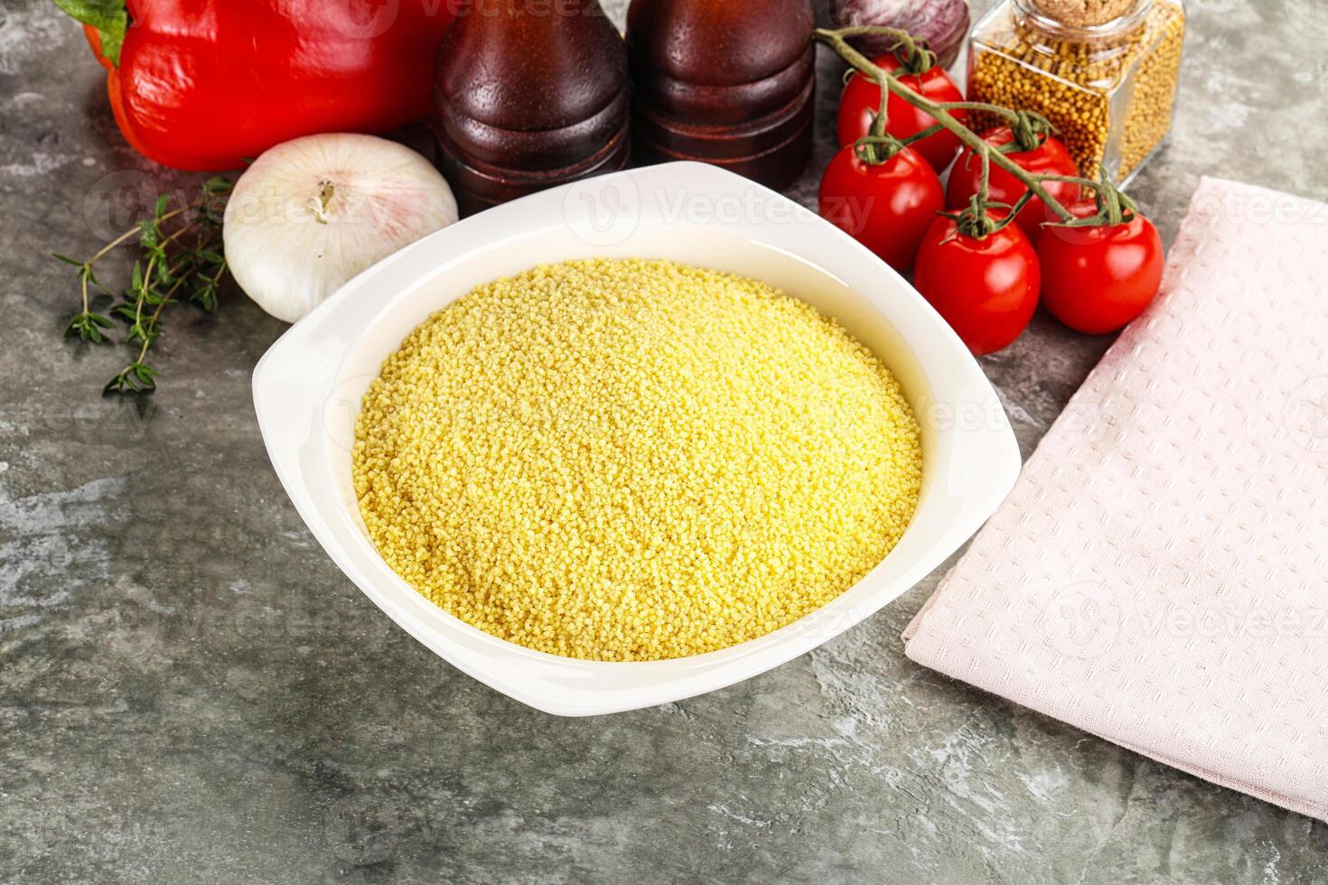 Raw dry wheat couscous grain photo