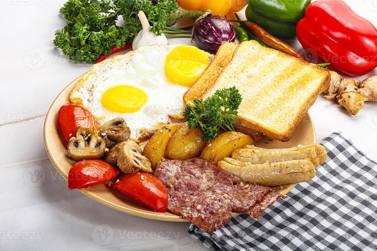 English breakfast with toast, egg and sausages photo