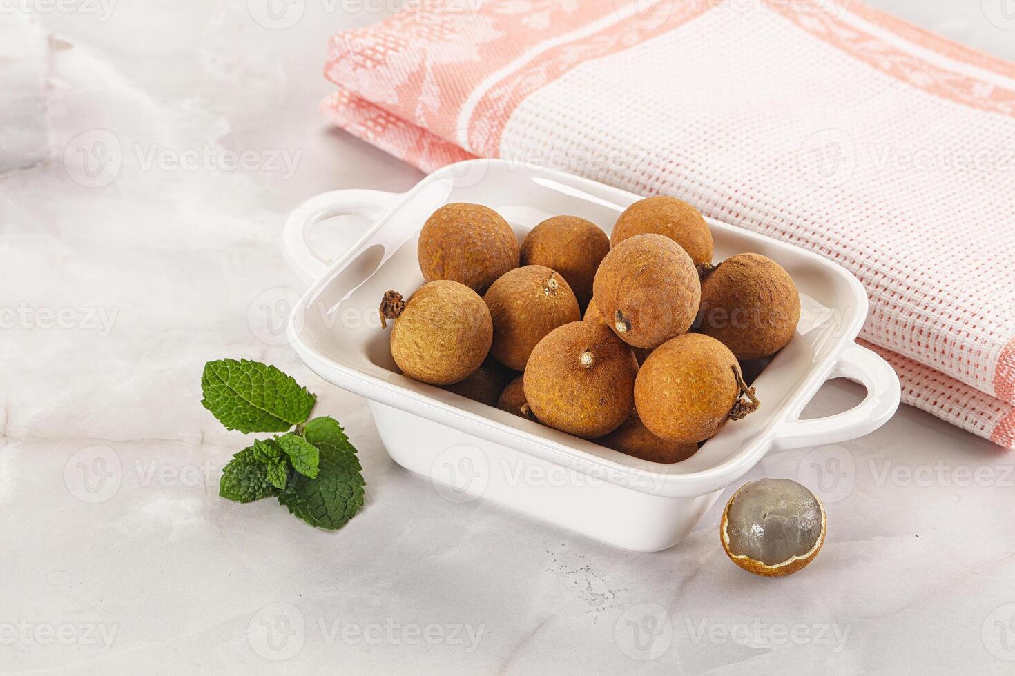 Tropical delicous fruit Longan heap photo