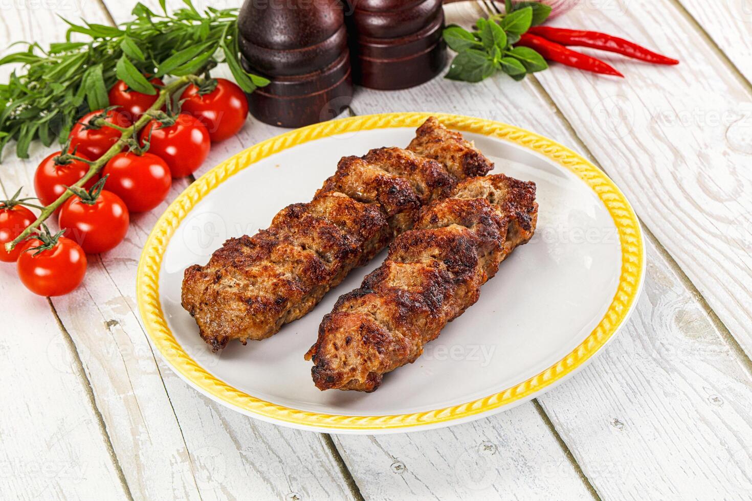 Chicken kebab minced meat and spices photo