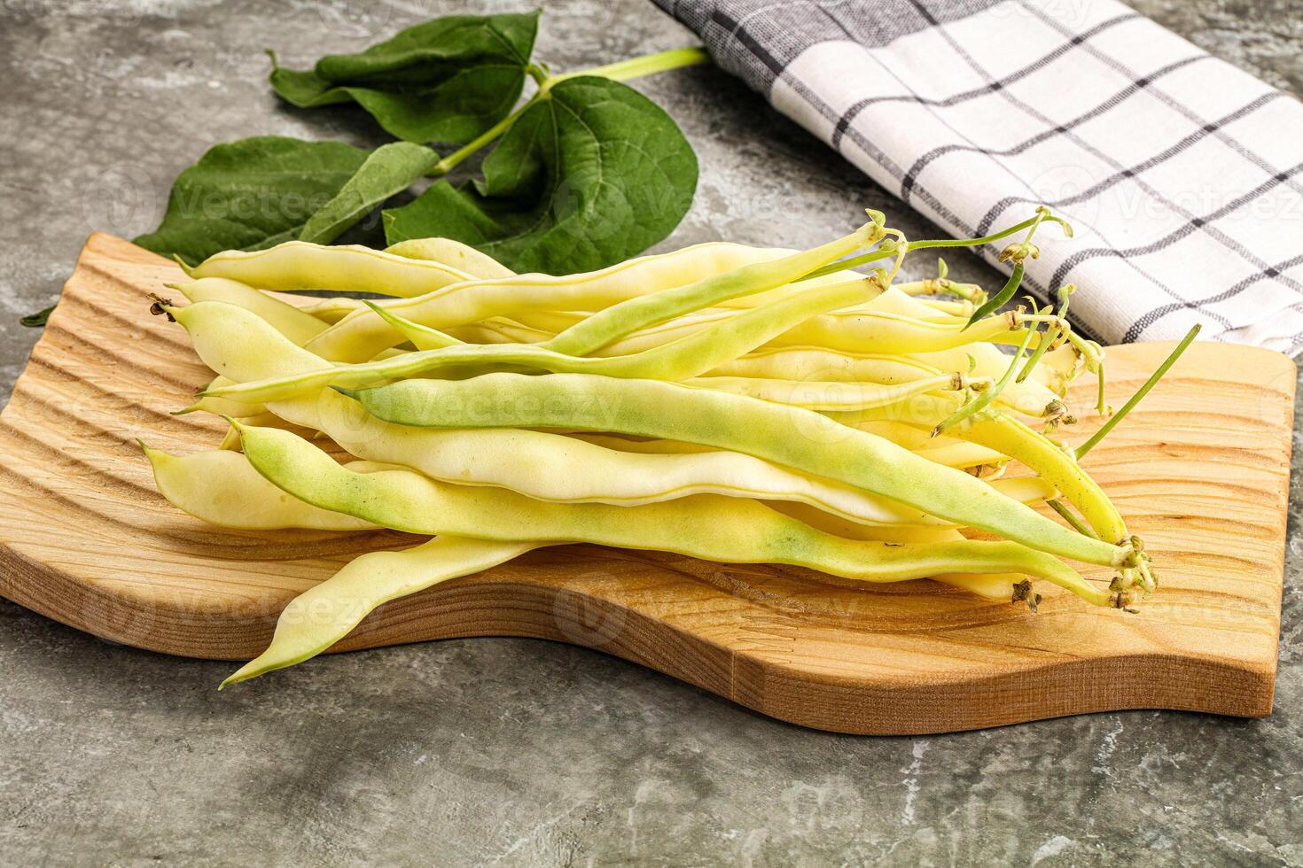 Raw green bean strings heap photo