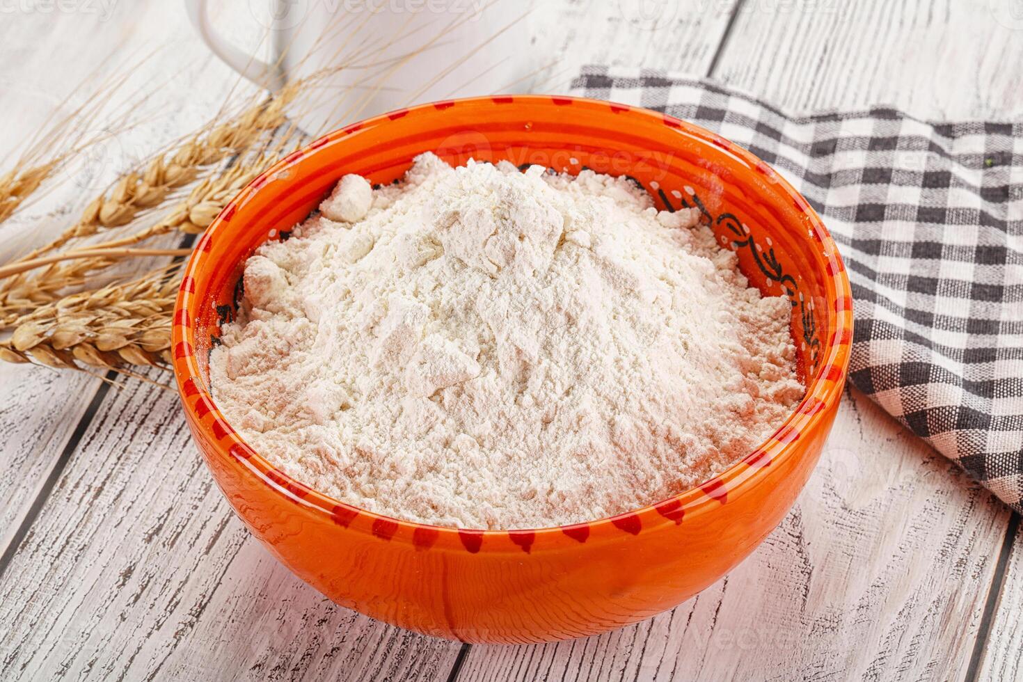 Wheat flour heap for bake photo