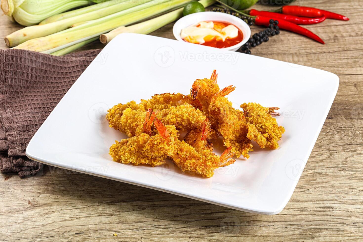 Golden deep prawn tempura wuth sauce photo