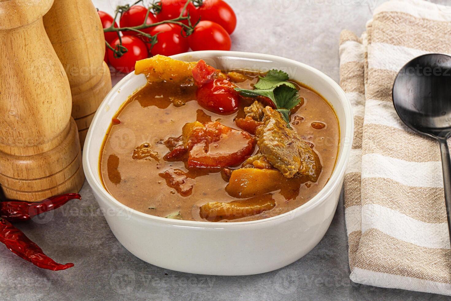 Yellow Thai curry with beef photo