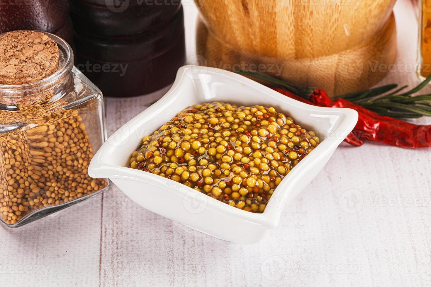 Spicy mustard sauce with seeds photo