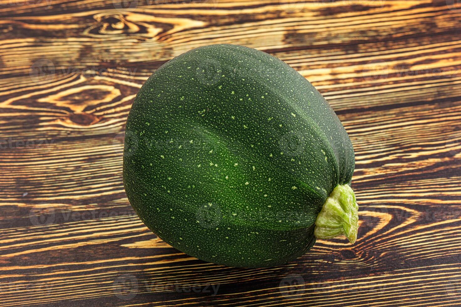 Raw green round zucchini vegetable photo