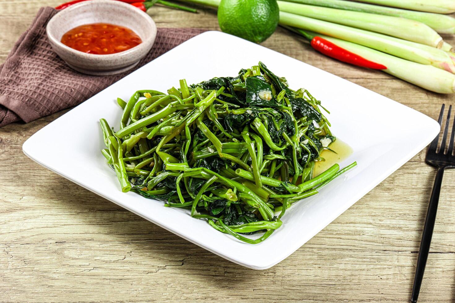 Asian cuisine stir fried morning glory photo