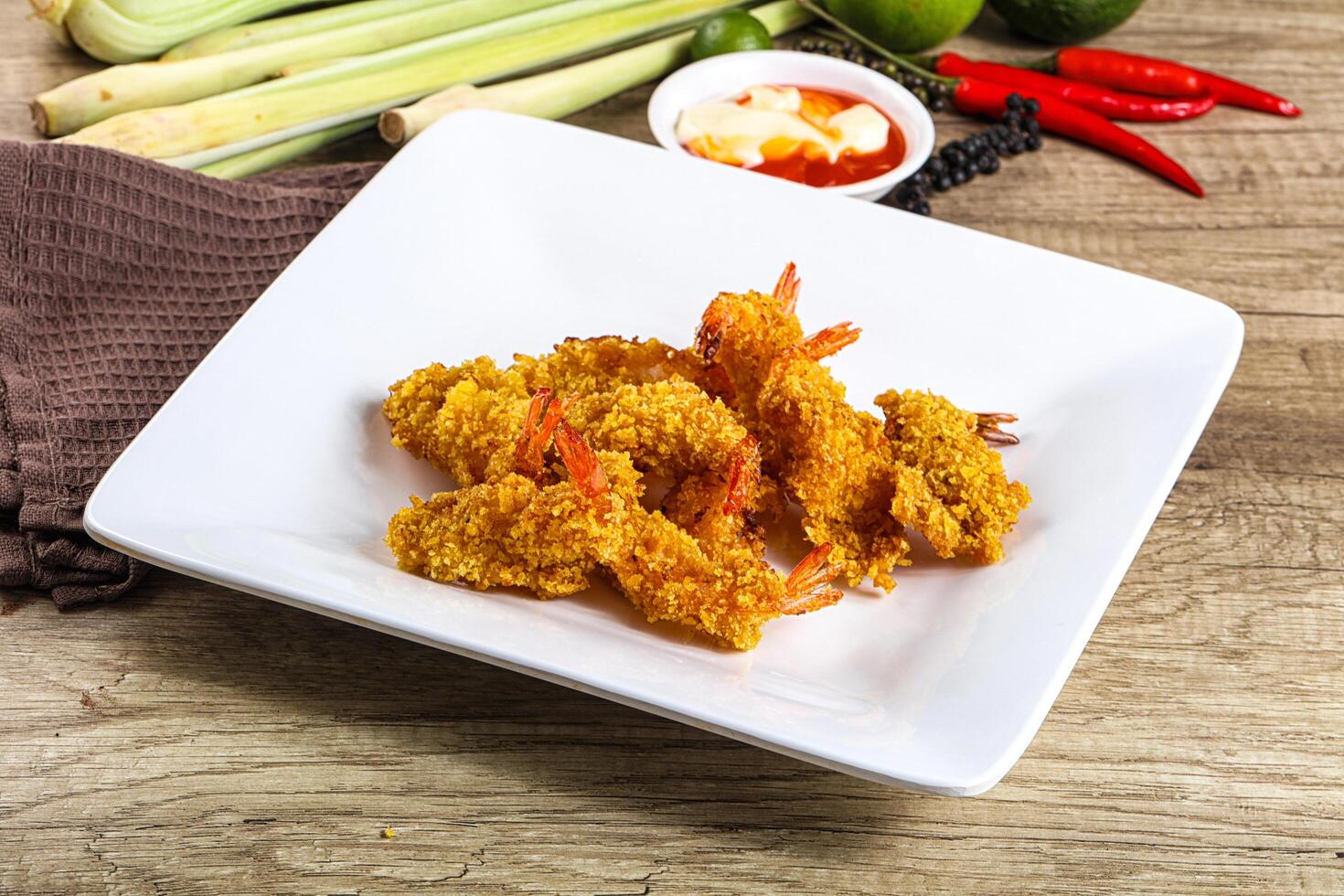 Golden deep prawn tempura wuth sauce photo