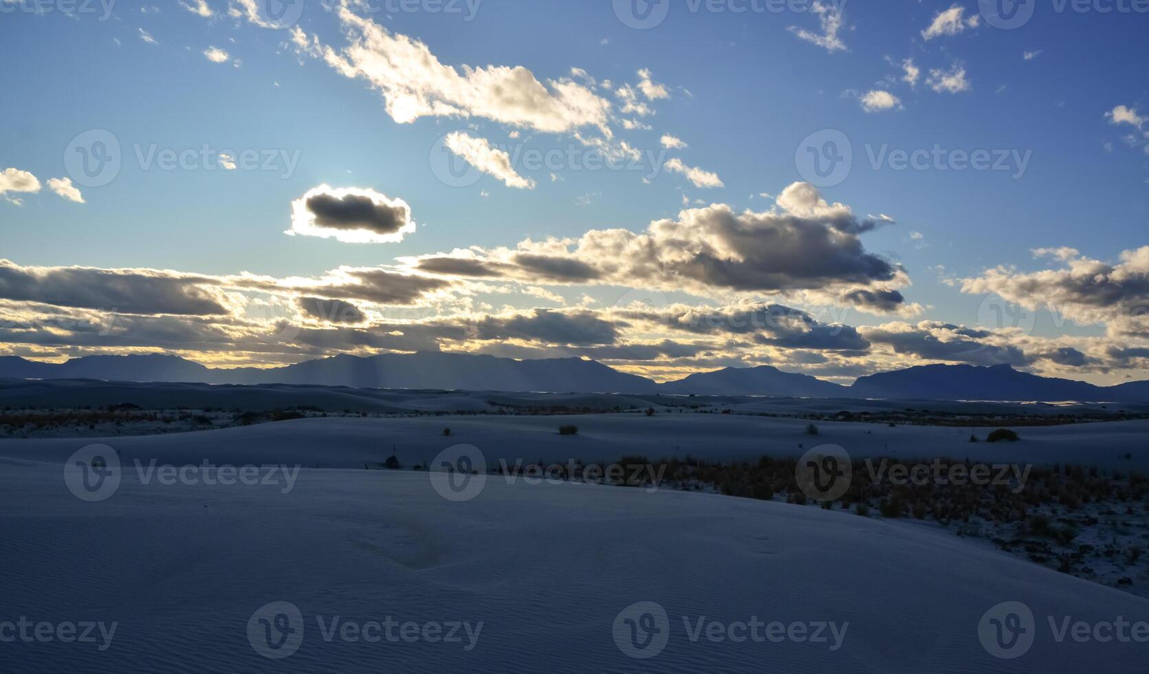 White clouds during sunset over White Sands in New Mexico, USA photo