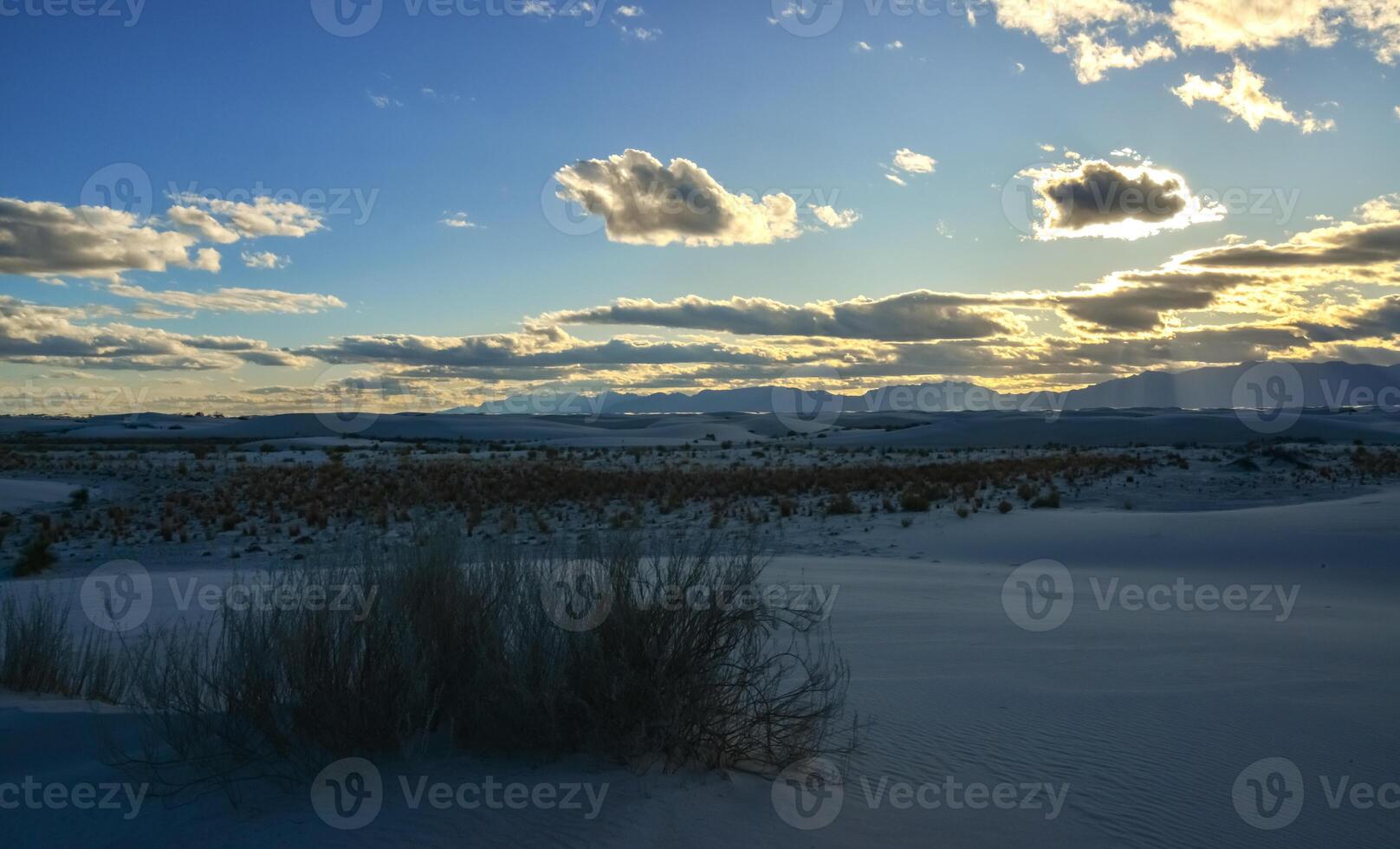 White clouds during sunset over White Sands in New Mexico, USA photo