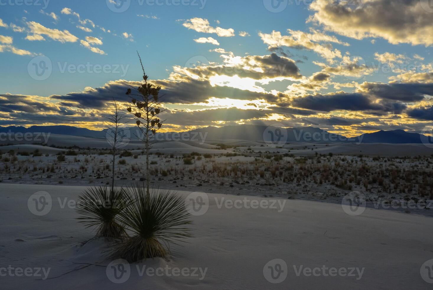 White clouds during sunset over White Sands in New Mexico, USA photo