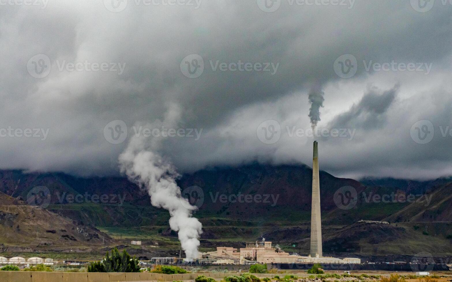 Oil refinery and a factory for obtaining silver on the shore photo