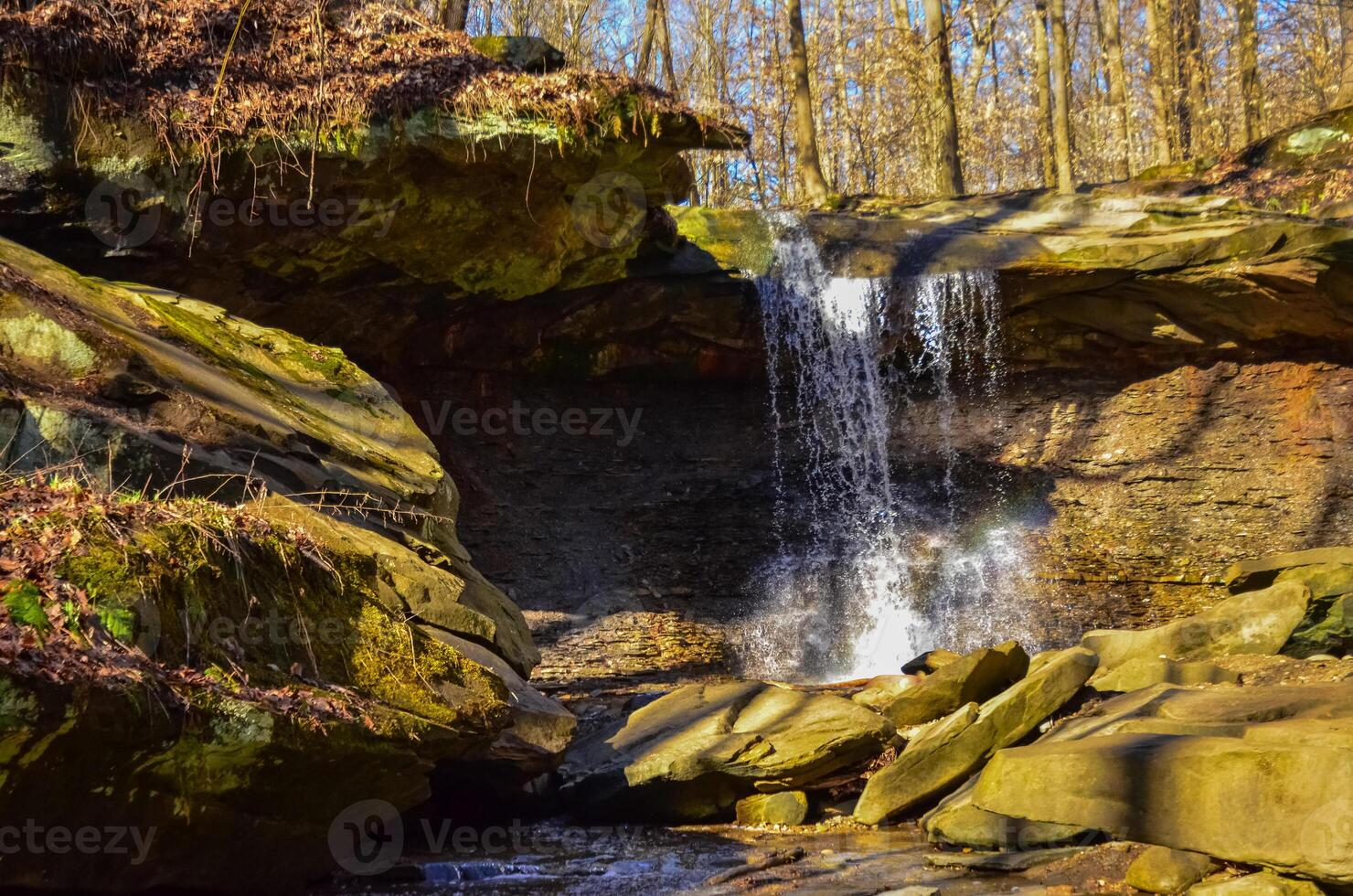 A small waterfall in the autumn in the forest in the parkon Brandywine Creek in Cuyahoga Valley National Park, Ohio. photo