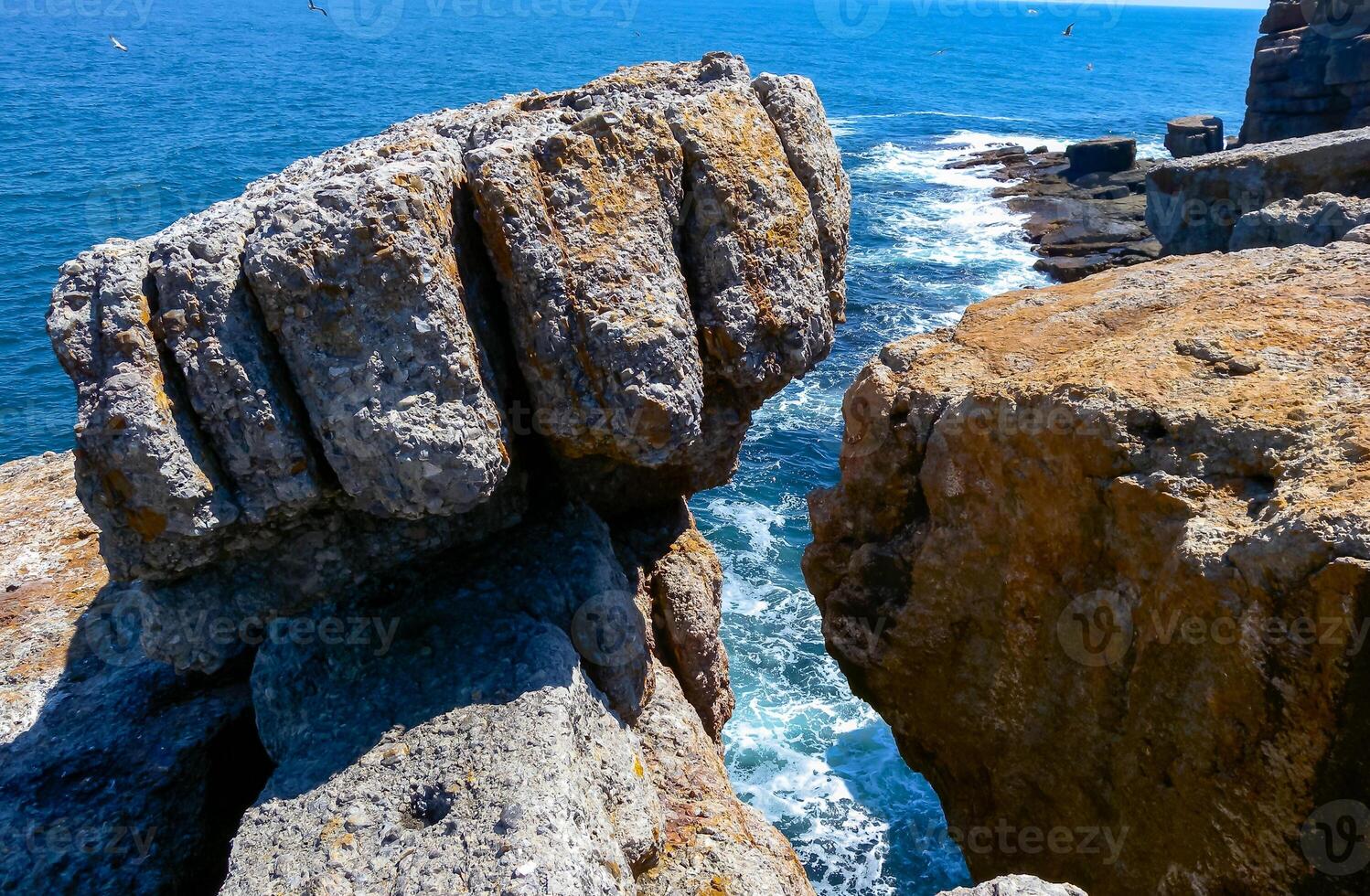 Coastal cliffs from the north side of Serpent's Zmeinyi Island, Ukraine photo