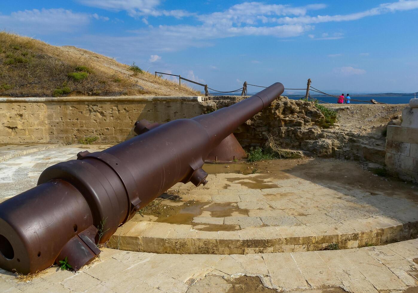 Canakkale, Turkey - AUGUST 28, 2014 - an ancient iron cannon raised from under the water in the Black Sea photo