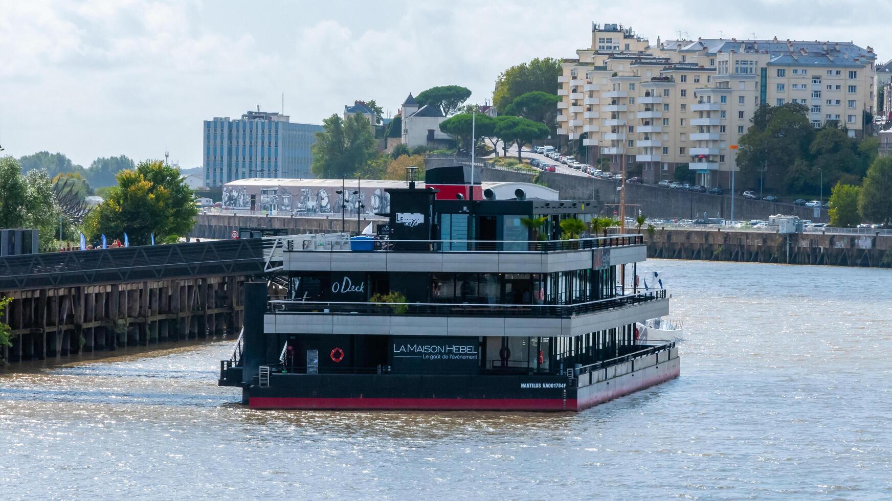 NANTES, FRANCE - SEPTEMBER 12, 2017 - floating restaurant on the river in Nantes, France photo