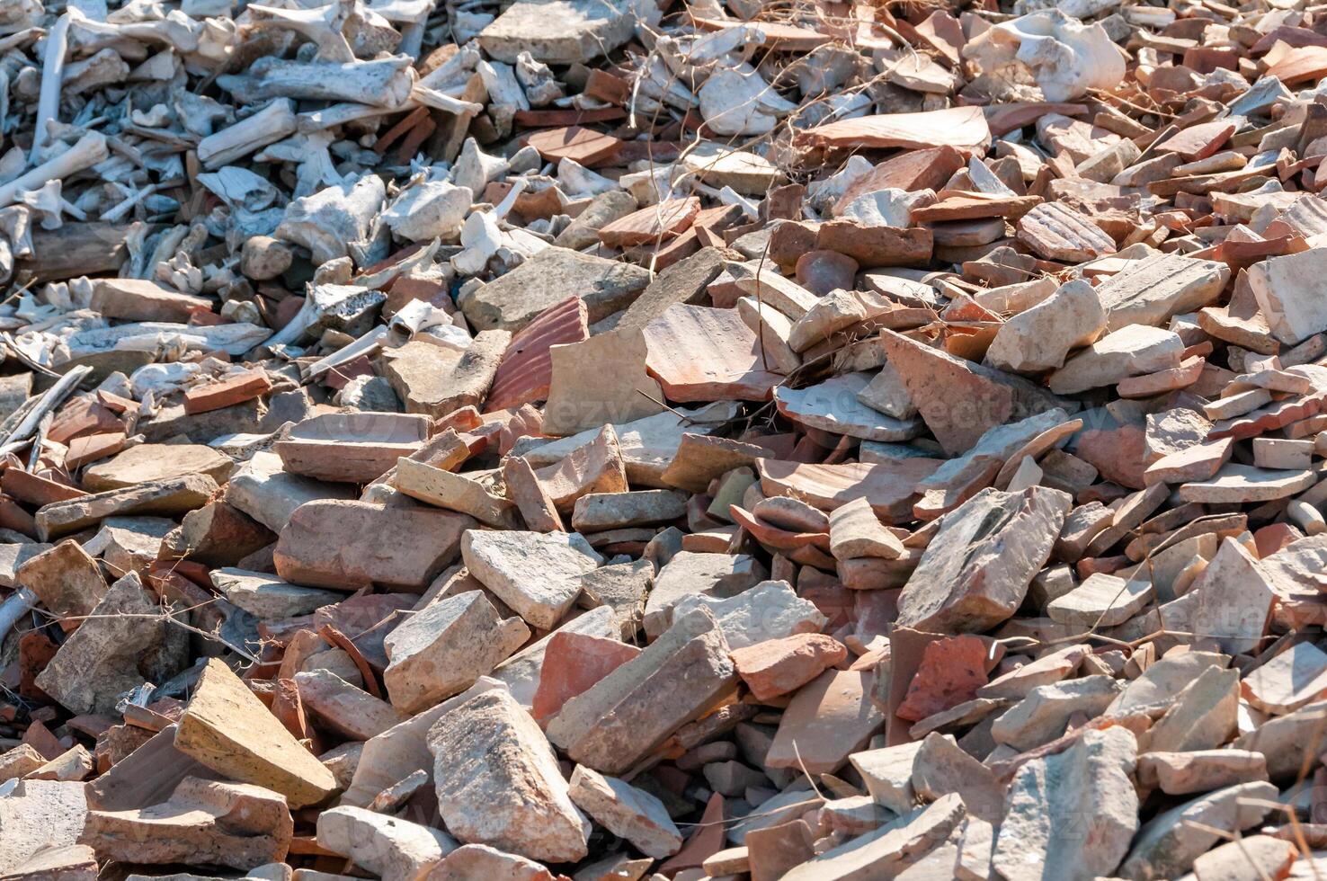 Pottery shards from excavations of an ancient city, archaeological site photo